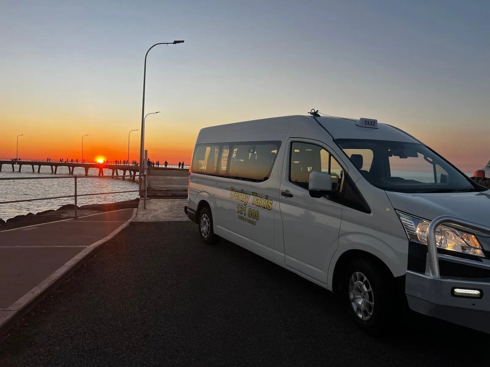 Derby Taxi van at sunset
